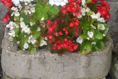 Stone basket of flowers